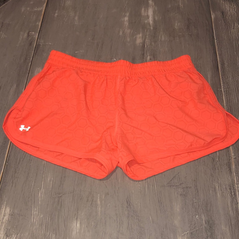 Women's Orange Under Armour shorts.